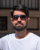 close-up-portrait-modern-pakistani-man-dark-beard-light-clothes-sunglasses-close-up-portrait-modern-pakistani-364351751